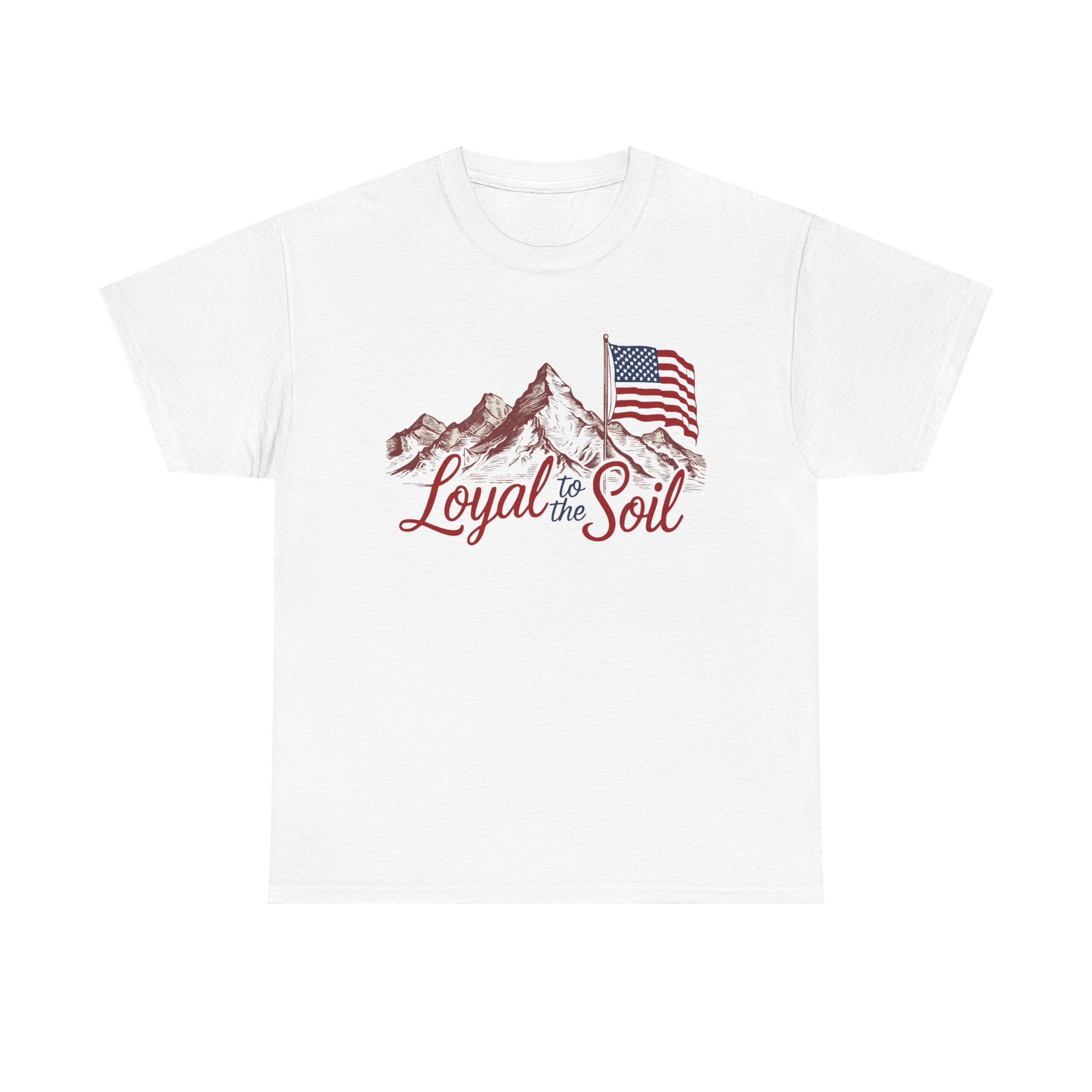 A white unisex heavy cotton t-shirt with a graphic print of mountains and an American flag, along with the text 'Loyal to the Soil'.