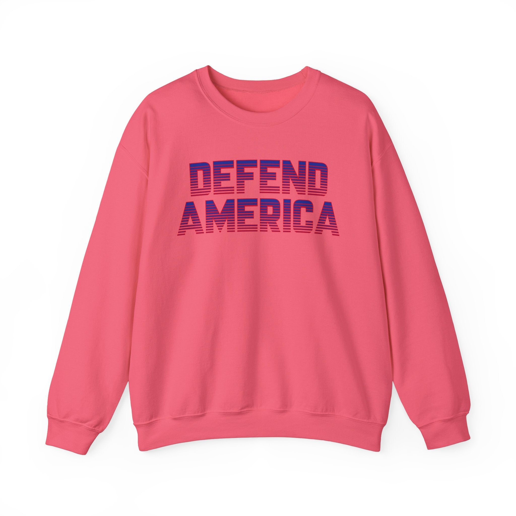 A pink unisex crewneck sweatshirt with 'DEFEND AMERICA' text in bold letters on the front.