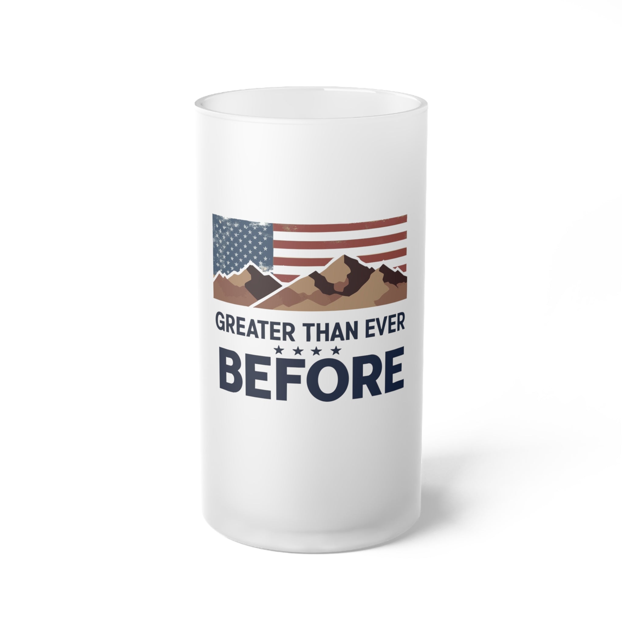 A frosted glass beer mug with a patriotic design featuring the American flag and mountains, along with the text 'GREATER THAN EVER BEFORE'.