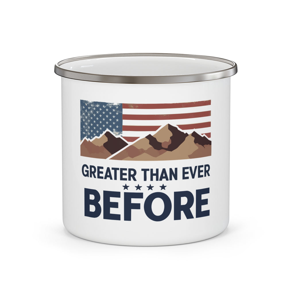 A white enamel camping mug with a mountain range and an American flag design, and the text 'GREATER THAN EVER BEFORE' printed on it.