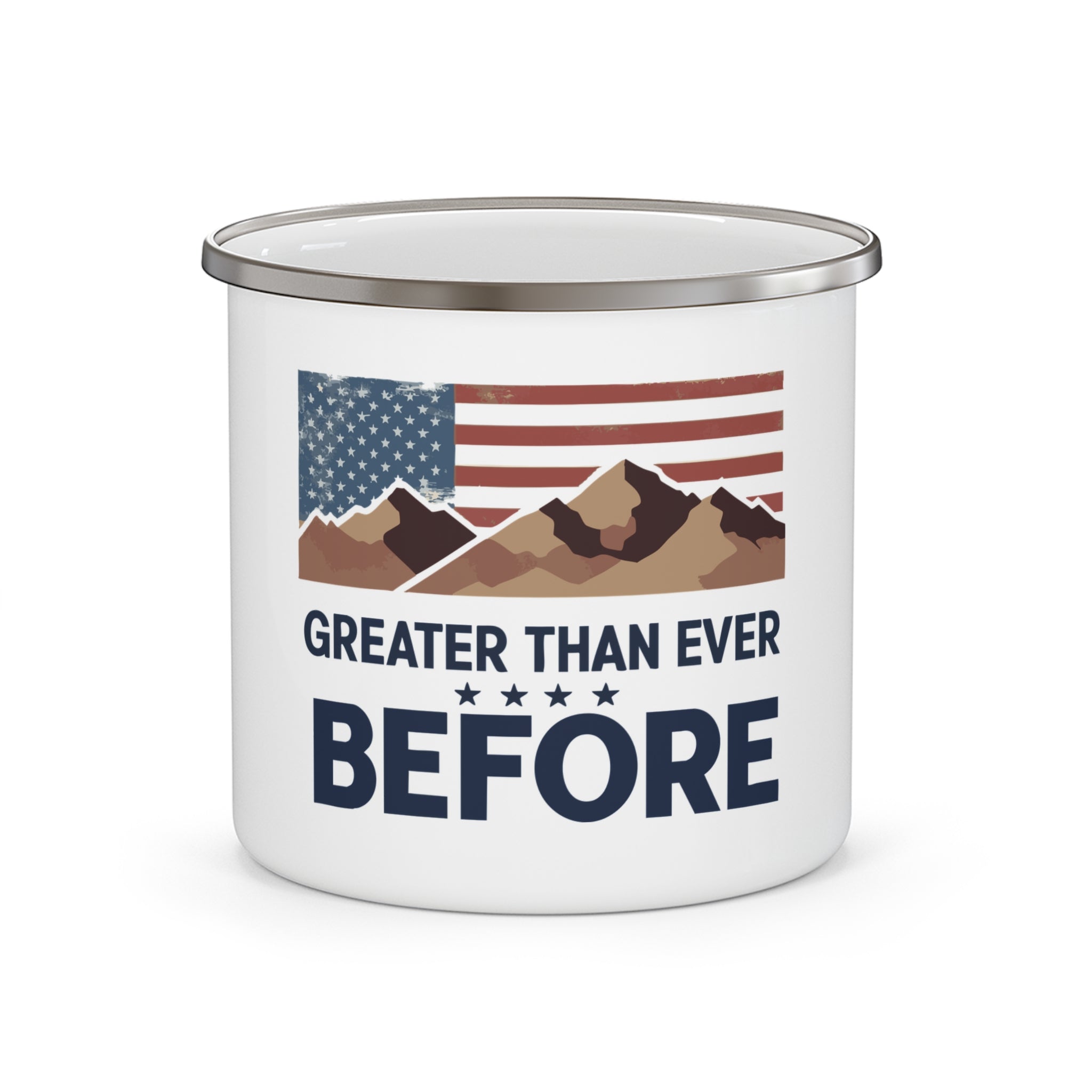 A white enamel camping mug with a mountain range and an American flag design, and the text 'GREATER THAN EVER BEFORE' printed on it.