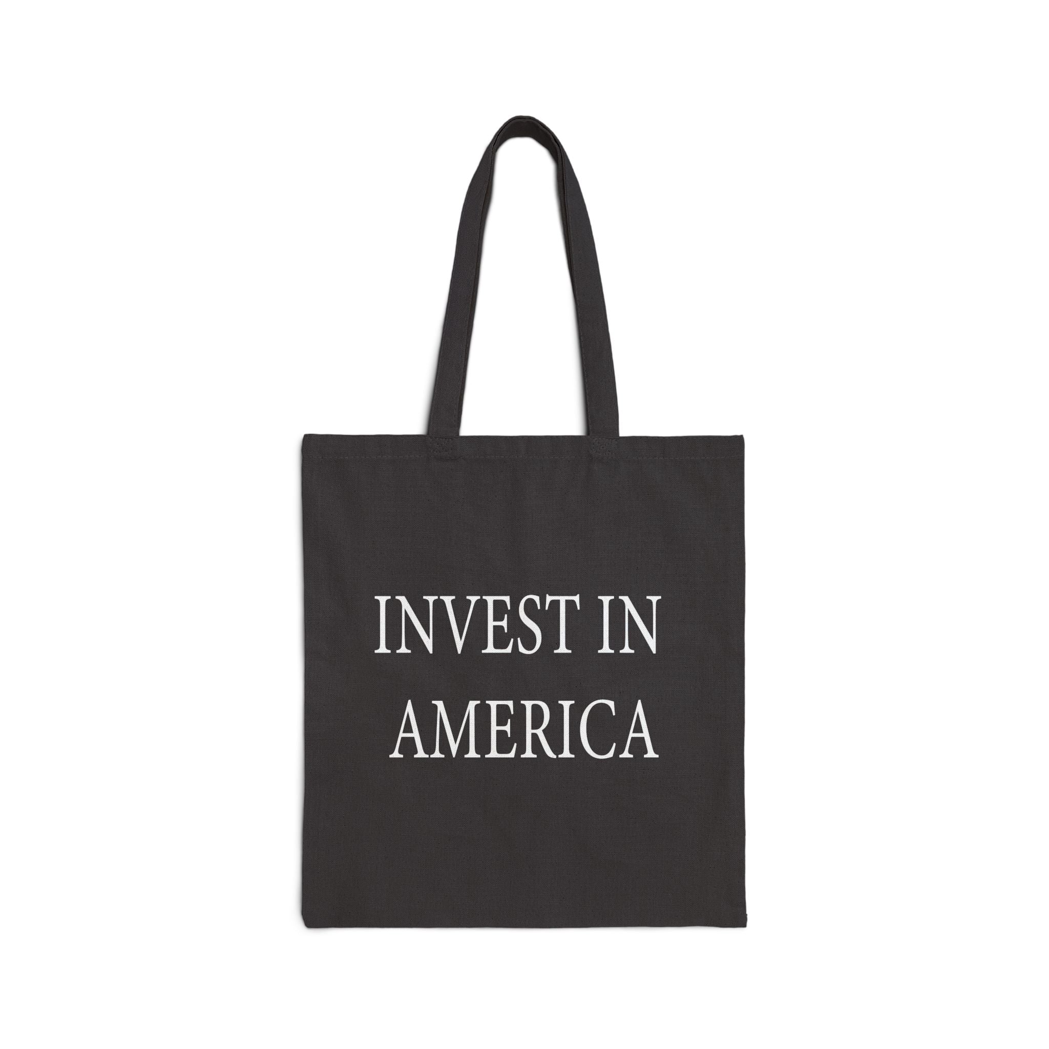 Black tote bag with 'INVEST IN AMERICA' text on a white background