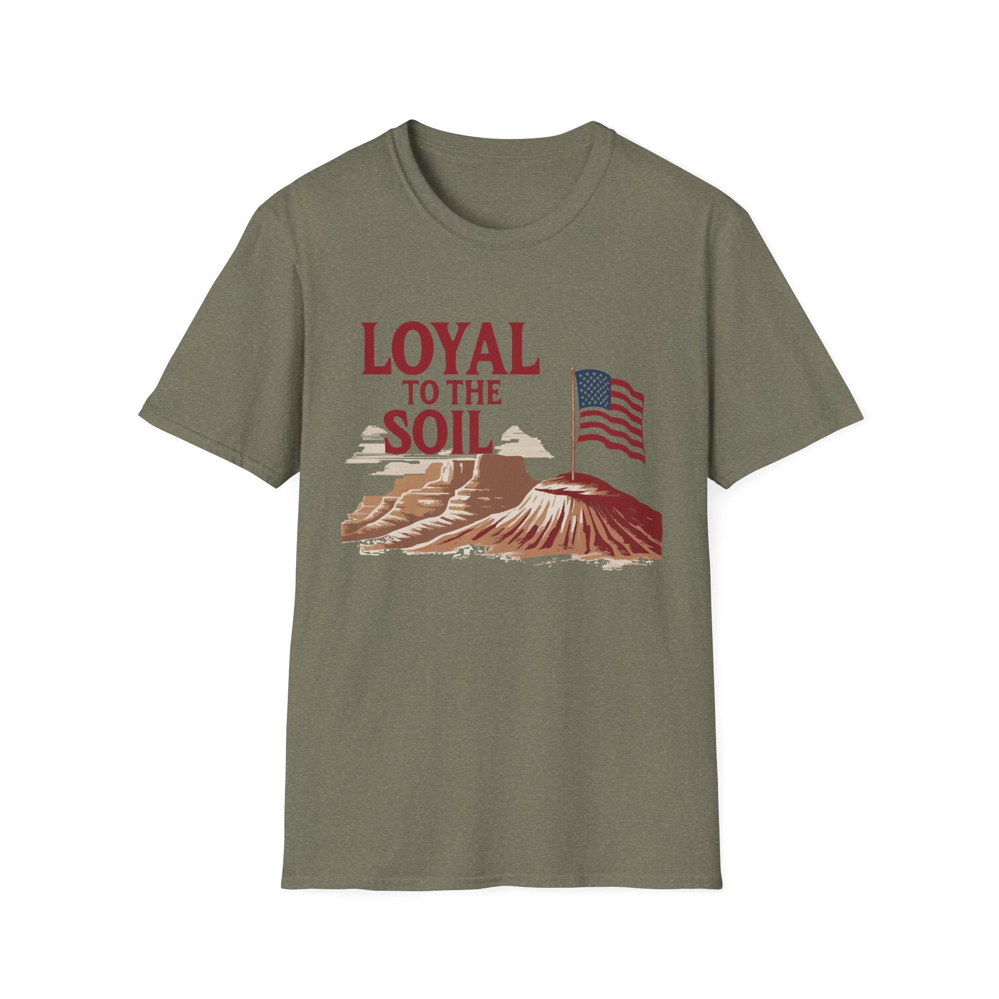 A green unisex softstyle T-shirt with a graphic print that includes an American flag and the text 'LOYAL TO THE SOIL' on a design featuring a mountain range.